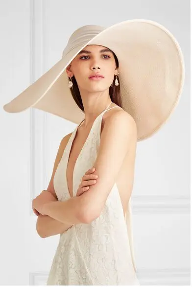 Eugenia Kim, Veruschka satin-trimmed raffia hat, $475, available on net-a-porter.com
