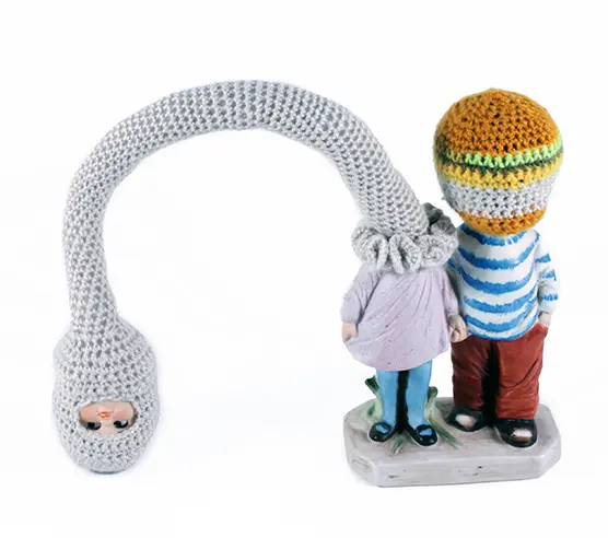 One of the highlights of the silent auction is Houston artist Elaine Bradford's "Not Again," formed from found objects and crochet.