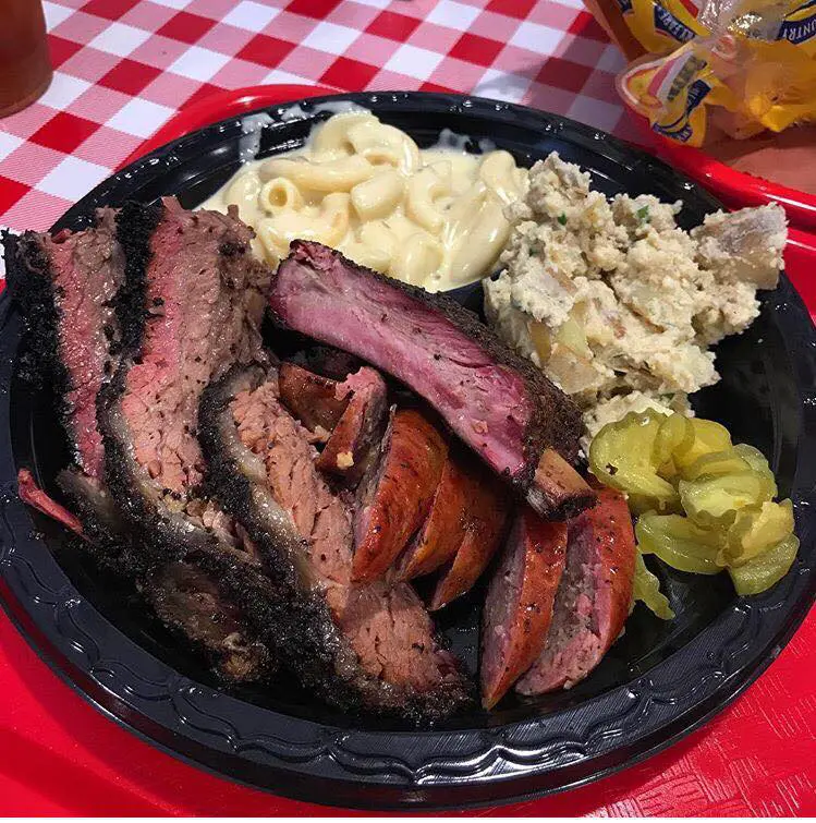 LJ's BBQ in Brenham takes care with its sides, like collard greens with bacon. 