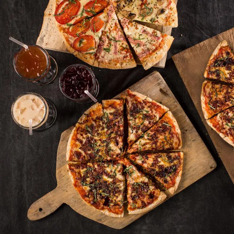 The balsamic bacon and quattro pizzas at San Martin.