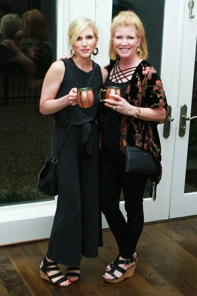 Ashley Shavo, Tina Dalton at the John Daugherty Realtors Spring Soirée open house at 12014 Tall Oaks. (Photo by Chris Bachman)
