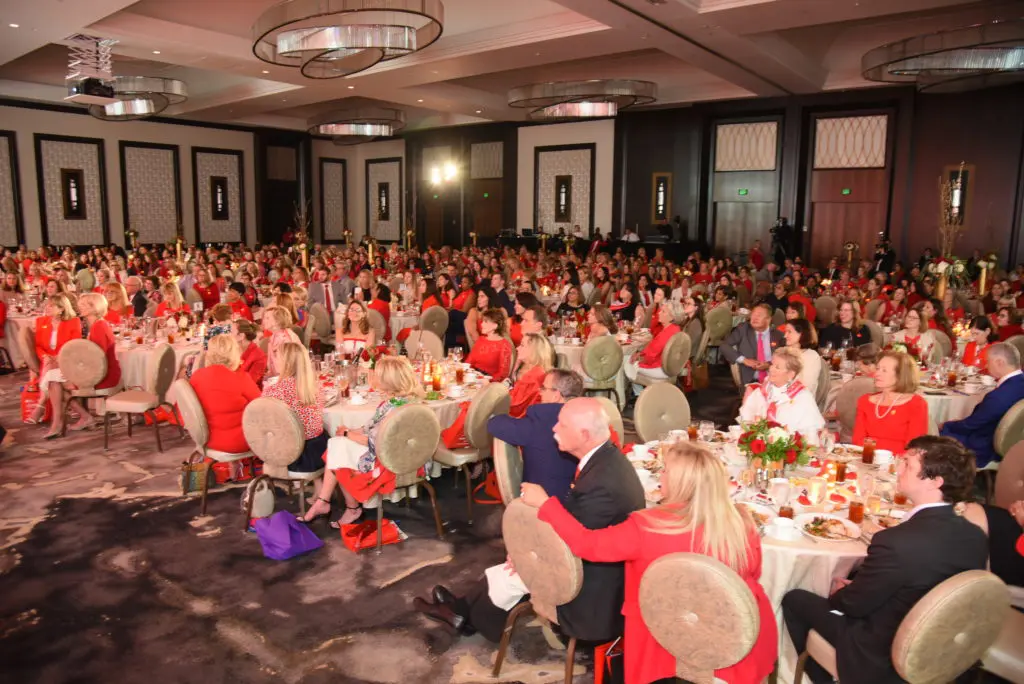 A room full of women dressed in red brings in $2 million for the American Heart Association Go Red for Women luncheon. 