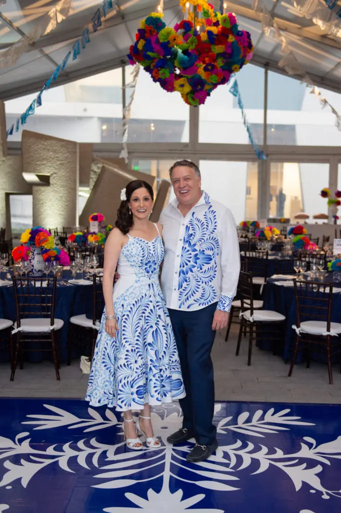 Glassell School of Art benefit chairs Luz Garcini, Marc Melcher in custom outfits from San Miguel de Allende. (Photo by Wilson Parish)