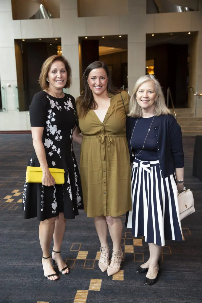 Polly Bowden, Natalie Barr, Kristi Lumpkins at the Hope and Healing Center & Institute's annual Chrysalis Award luncheon.