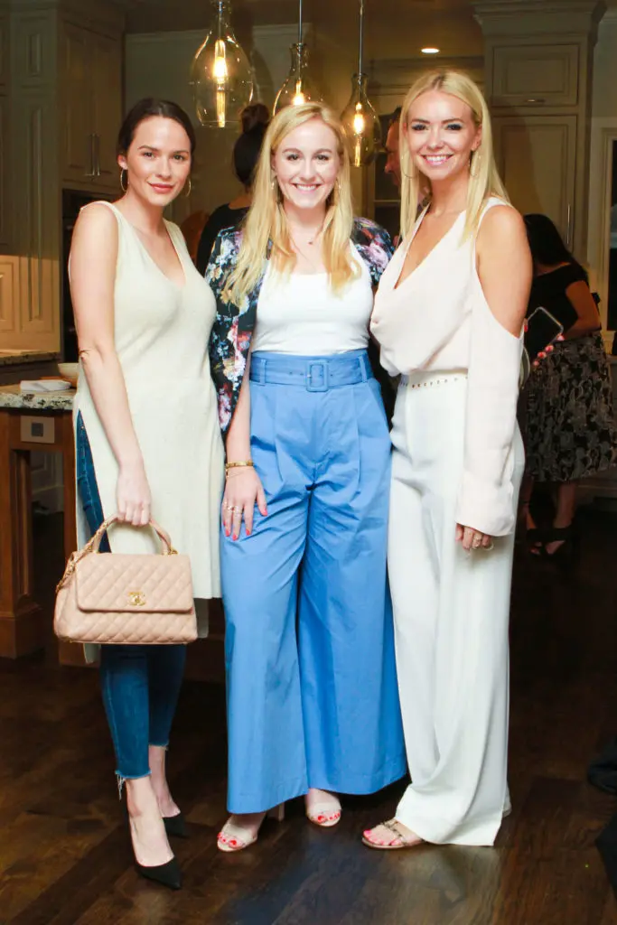 Hannah Swiggard, Hannah Nates, Courtney Cook at the John Daugherty Realtors Spring Soirée open house at 12014 Tall Oaks. (Photo by Chris Bachman)
