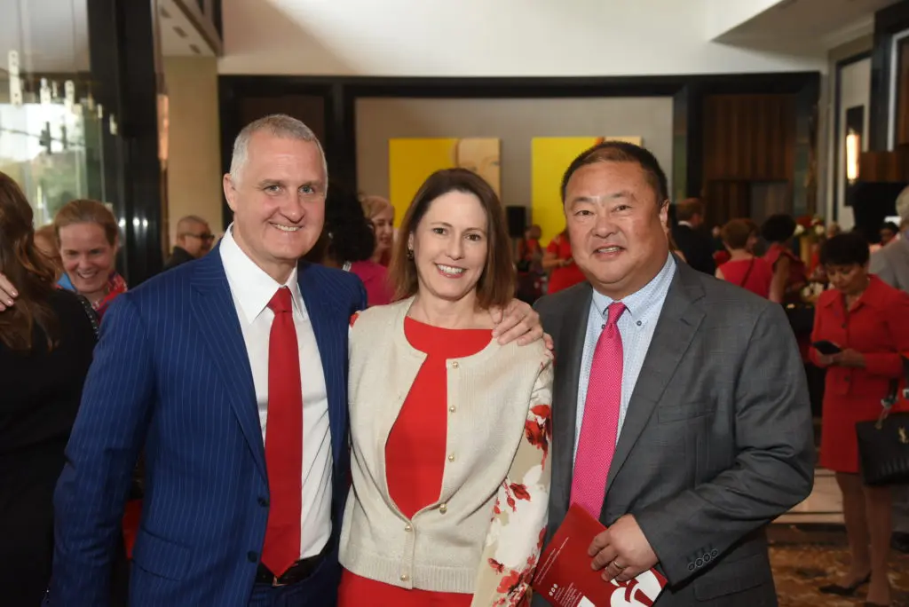 Jim Wetwiska, Rachel Clingman, John Kim at the annual Go Red for Women luncheon.