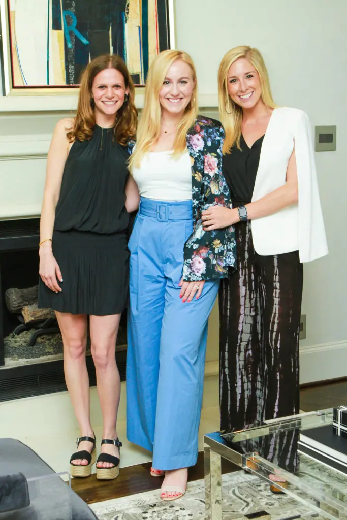Megan Orel, Hannah Nates, Meredith Kelly at the John Daugherty Realtors Spring Soirée open house at 12014 Tall Oaks. (Photo by Chris Bachman)