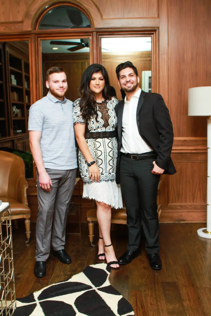 Peter Sendukas, Sarah Ghabessi, Amir Ashon at the John Daugherty Realtors open house in Memorial. (Photo by Chris Bachman)