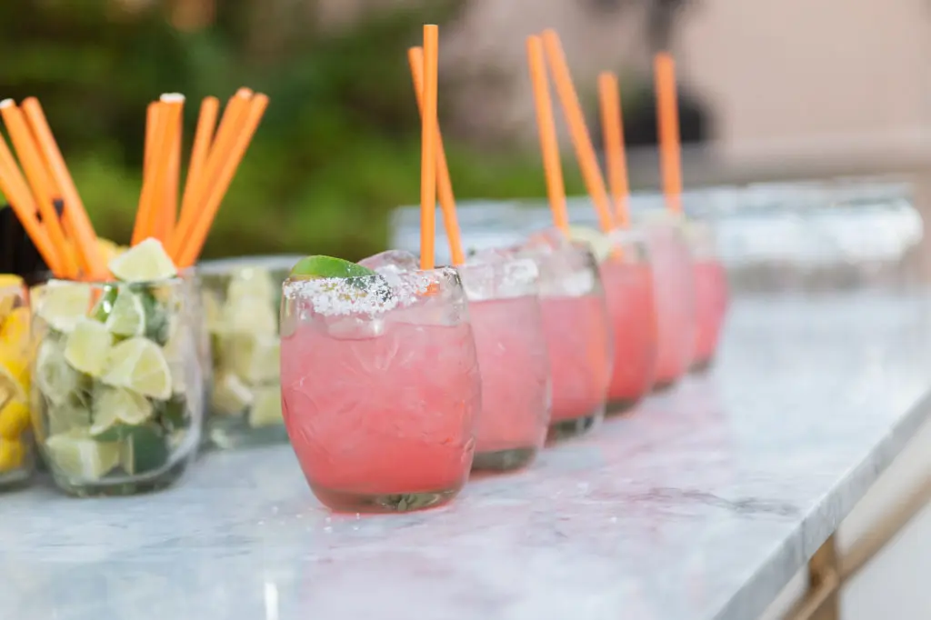 Poolside cocktails at the Rienzi Spring Party. (Photo by Wilson Parish)