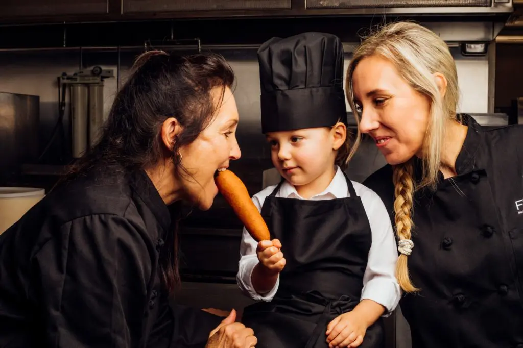  Vic Fletcher and her daughter Jace Fletcher are combining on a new Dallas pop-up restaurant and catering business. With a little help from the grandson. (Photo by  James Coreas)