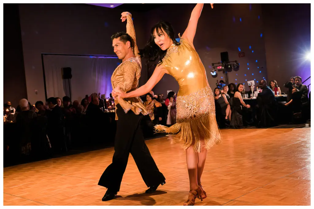 Alex Olivares, Dr. Cindy Berthelot-Li, the 2018 dance competition winner, at the 2019 Asian Pacific American Heritage Association Gala. (Photo by Ricky Guinhawa)