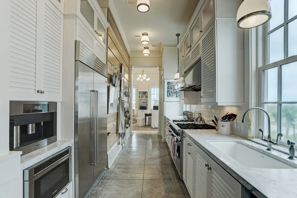 The galley-style kitchen in this Beachtown residence is a home cook's dream. (Photo by TK Images)