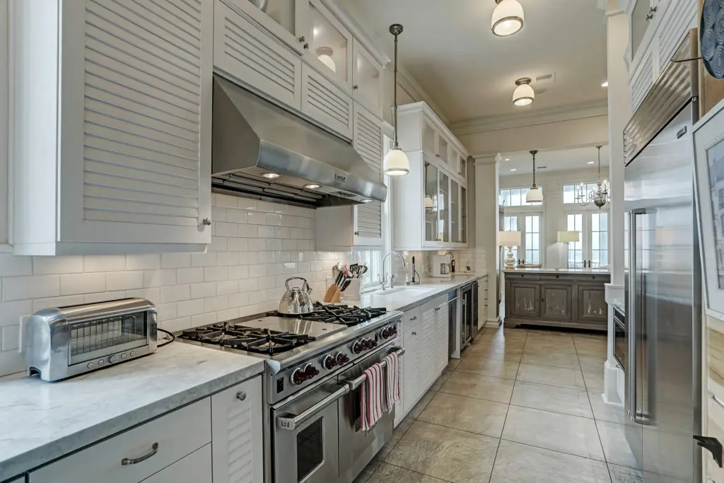 The kitchen in this Beachtown home on Galveston Island opens to a greater living area. (Photo by TK Images)