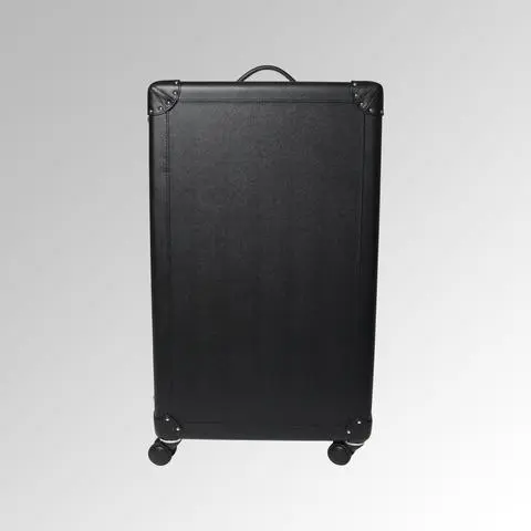 Hillery adores T. Anthony's Bespoke Dressage rolling case ($5,500). Available on tanthony.com.