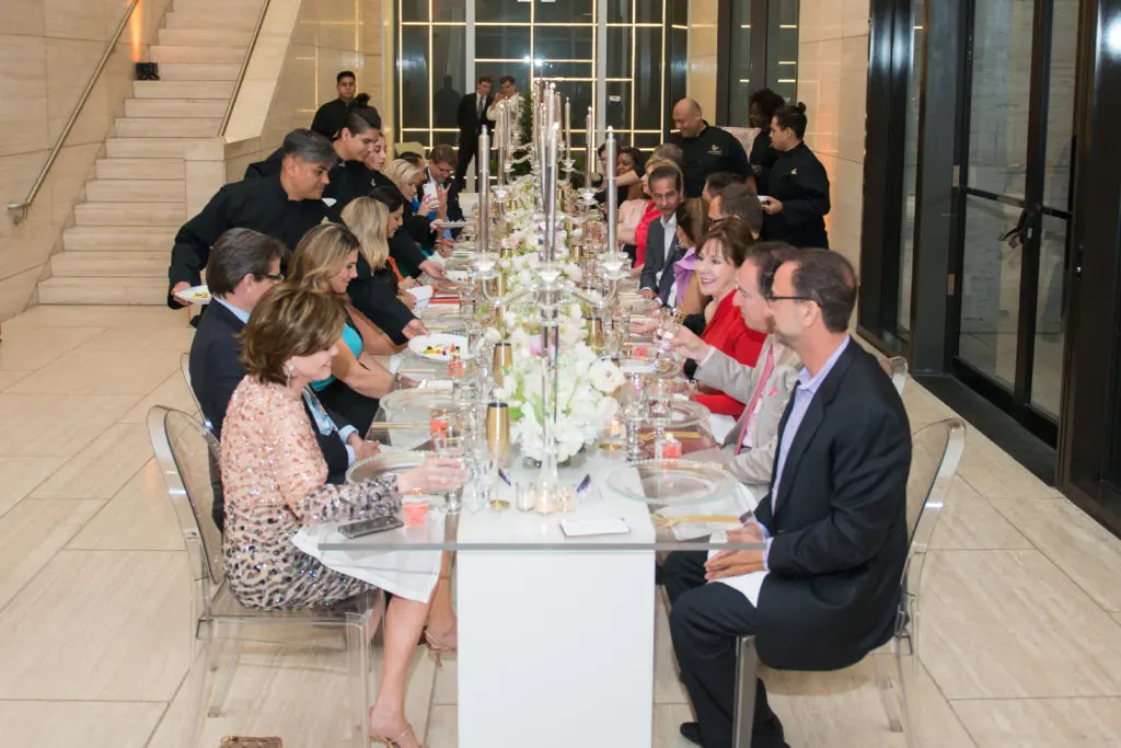 Dinner is served by staff from Potente at the Jordan Alexander dinner party. (Photo by Jacob Power)