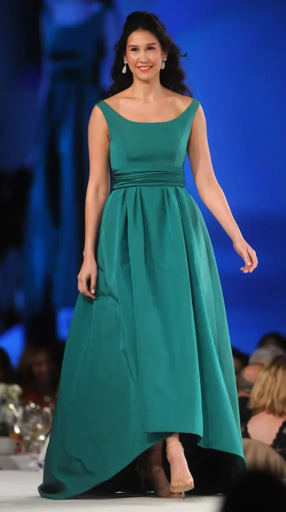 A model walks the runway in fashions from Tootsie's at the Latin Women's Initiative Annual Fashion Show and Luncheon. (Dave Rossman Photo)