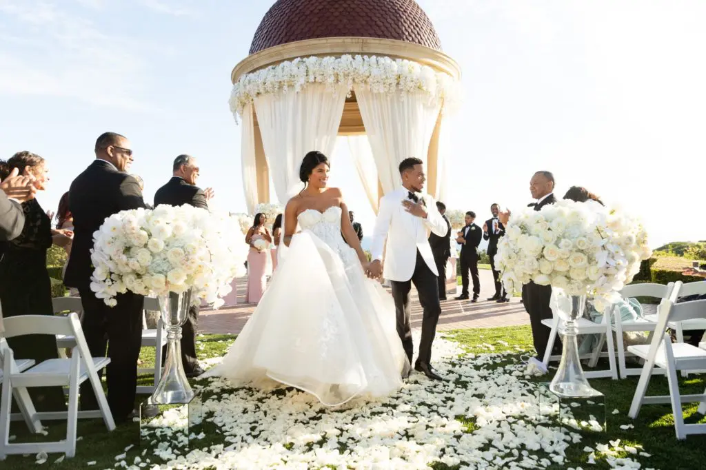 Kirsten Katrina Corley and Chancelor Jonathan Bennett, aka Chance the Rapper, wed at The Resort at Pelican Hill in Newport Beach in 2019. (Photo by Duke Images)
