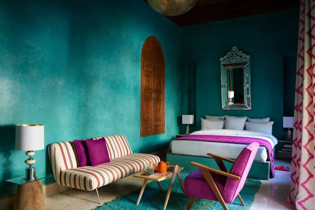 Color abounds throughout the romantic hostelry including guest rooms. (Photo by Kasia Gatkowska)