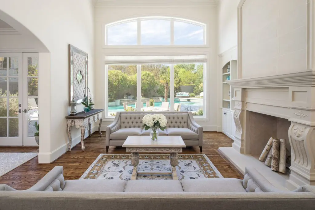 The living room features a magnificent fireplace. 
