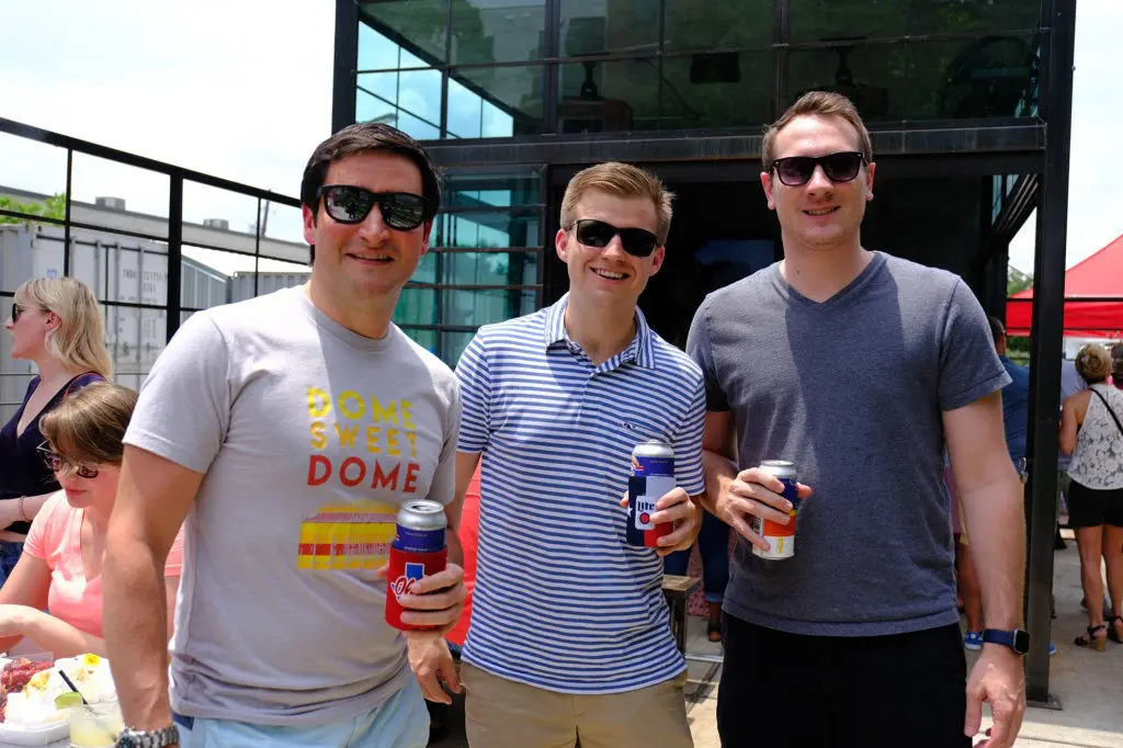 Byron George, James Bean, and Derek Helsby at the Barbara Bush Houston Literacy Foundation's Young Professionals Group crawfish boil.  (Photo by Daniel Ortiz)