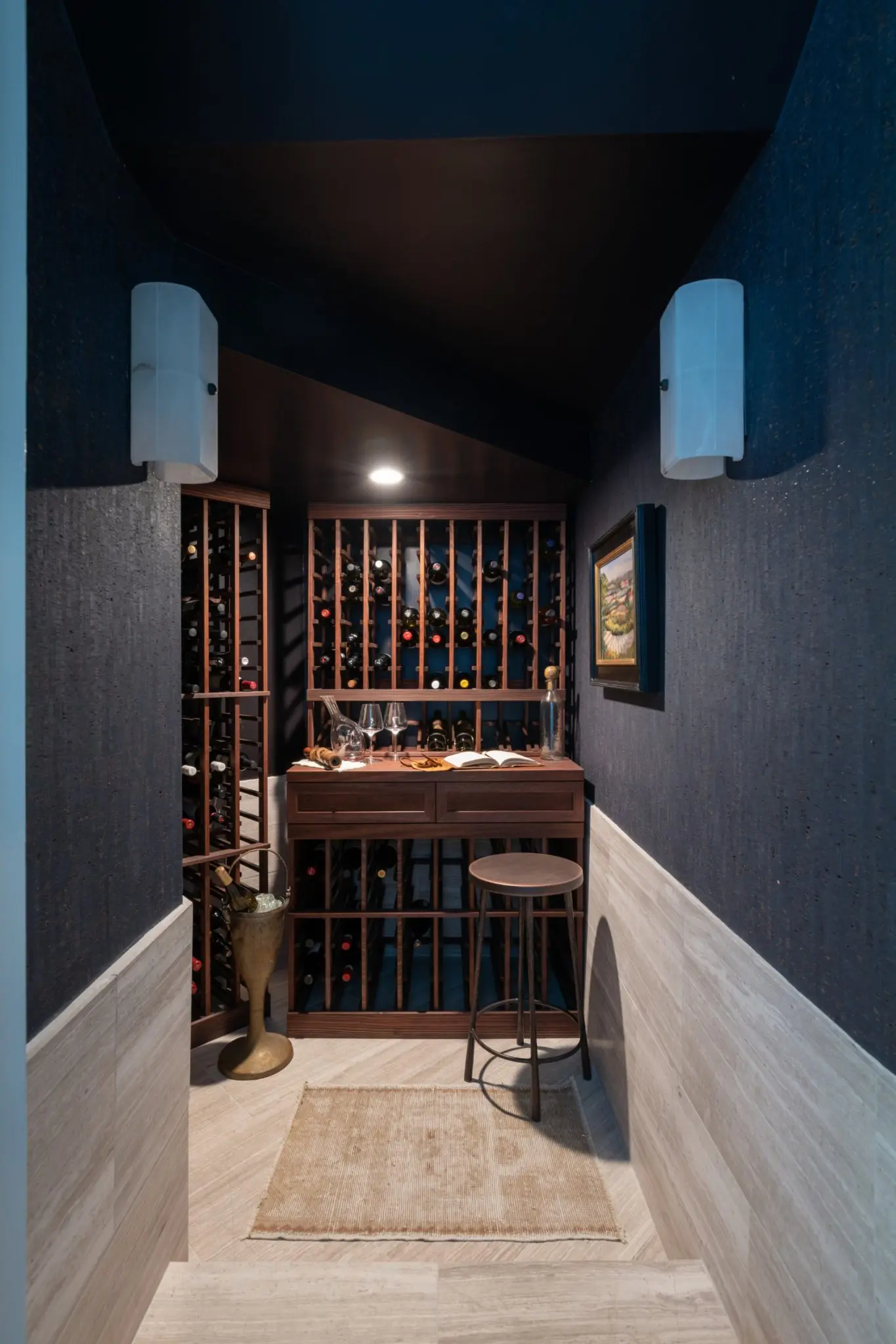 Cobalt Interiors created the cozy ambience of the wine cellar. (Photo by Michael Hunter Photography)