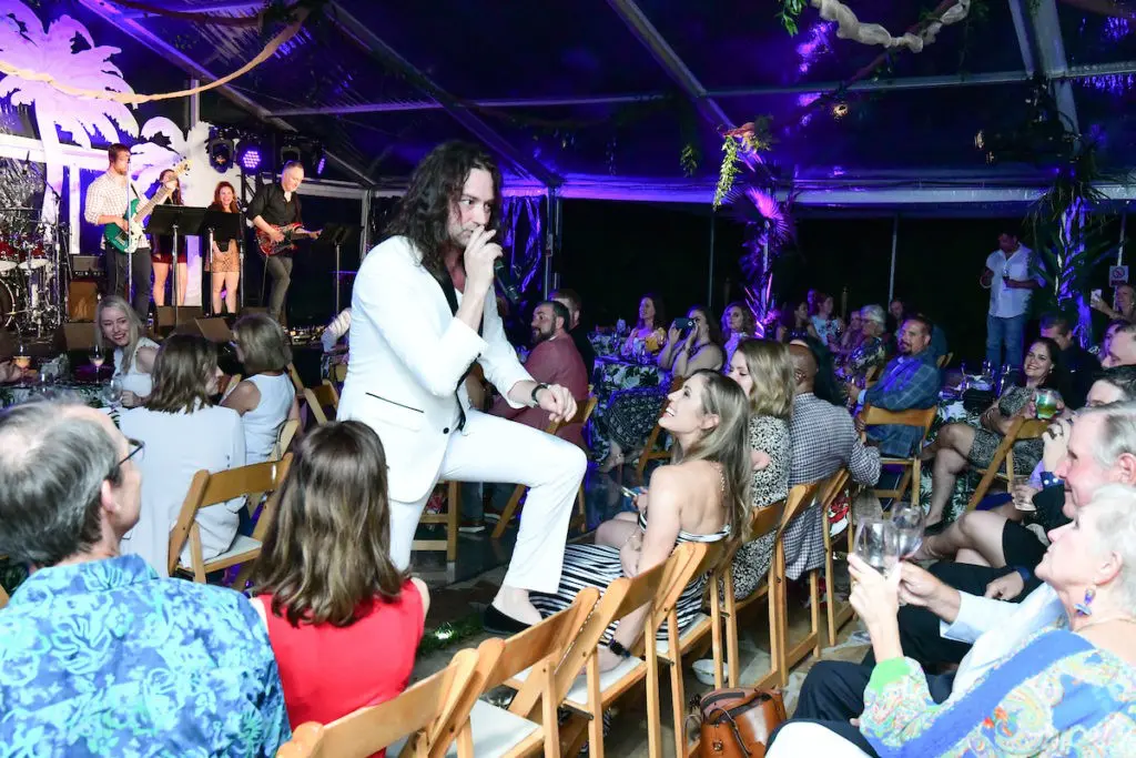 Broadway star and rock singer Constantine Maroulis gets up-close-and-personal with kick-off party guests. (Photo by Daniel Ortiz)