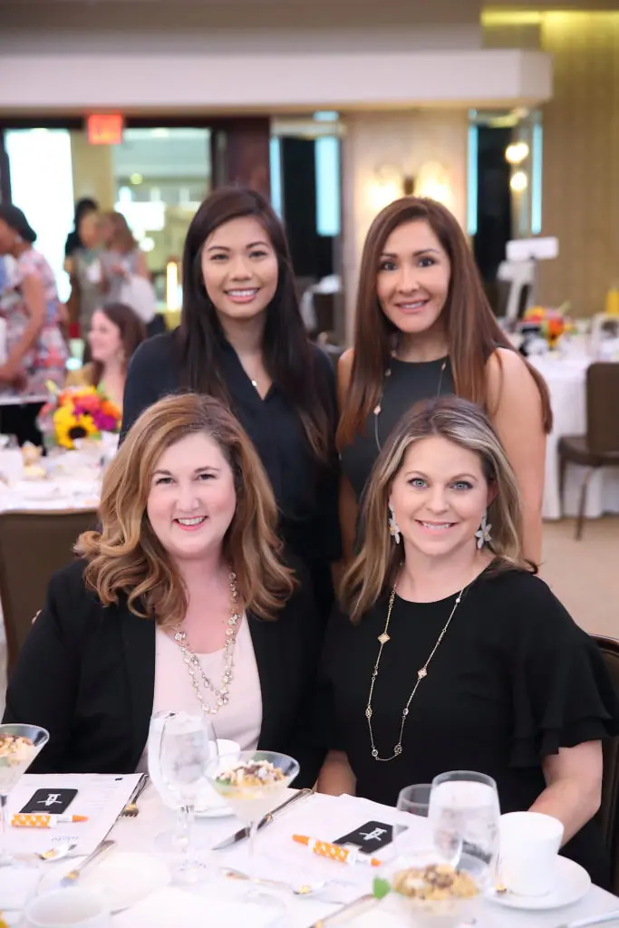 Elizabeth Nguyen, Magda Tamez, Liz Schaffner, Jennifer McSorley at Dress for Success Houston Corporate Guild Power Breakfast. (Photo by Quy Tran)