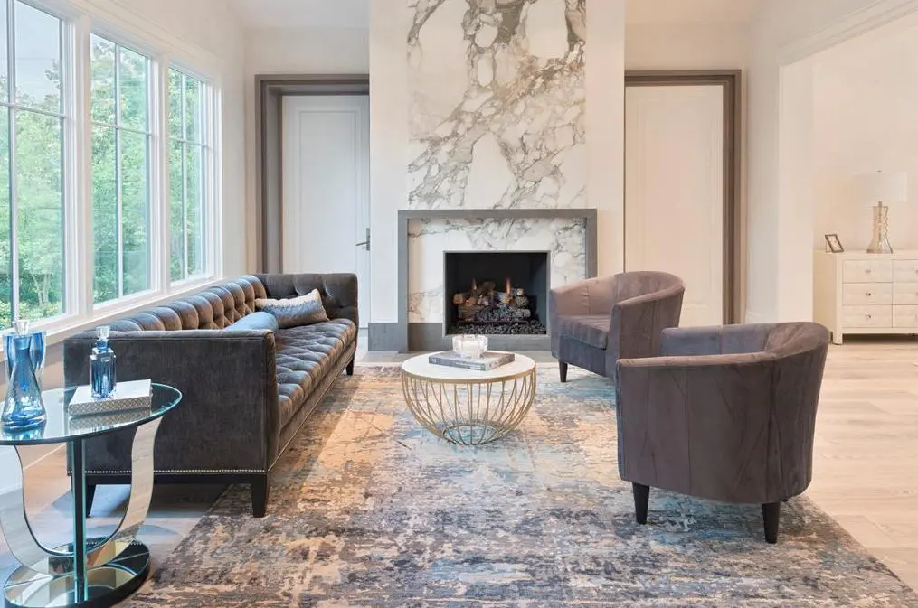 One of several living areas in the 11,500 square foot River Oaks home by Al Ross Luxury Homes. (Photo by TK Images)