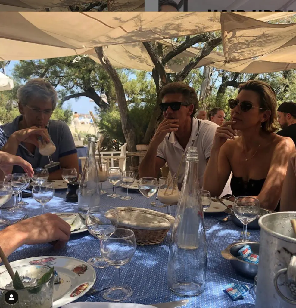 If only you could see what Dominique Sachse & Nick Florescu see at the wicked beachfront Le Club 55, perhaps the scantily clad girl in the giant champagne coup. (Photo by Instagram photos)