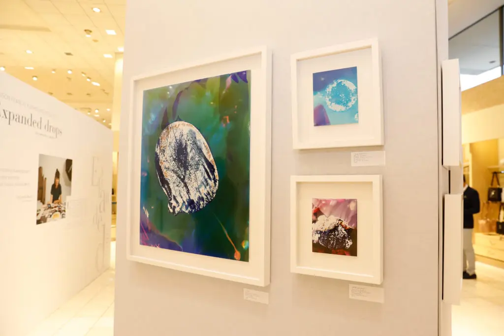 Christelle Boulé's photos are printed captures of perfume spritzed on paper and blown up to abstraction. Here, a colorful trio adorns a wall at Maison Francis Kurkdjian's "Expanded Drops" at Neiman Marcus. (Photo by Priscilla Dickson)