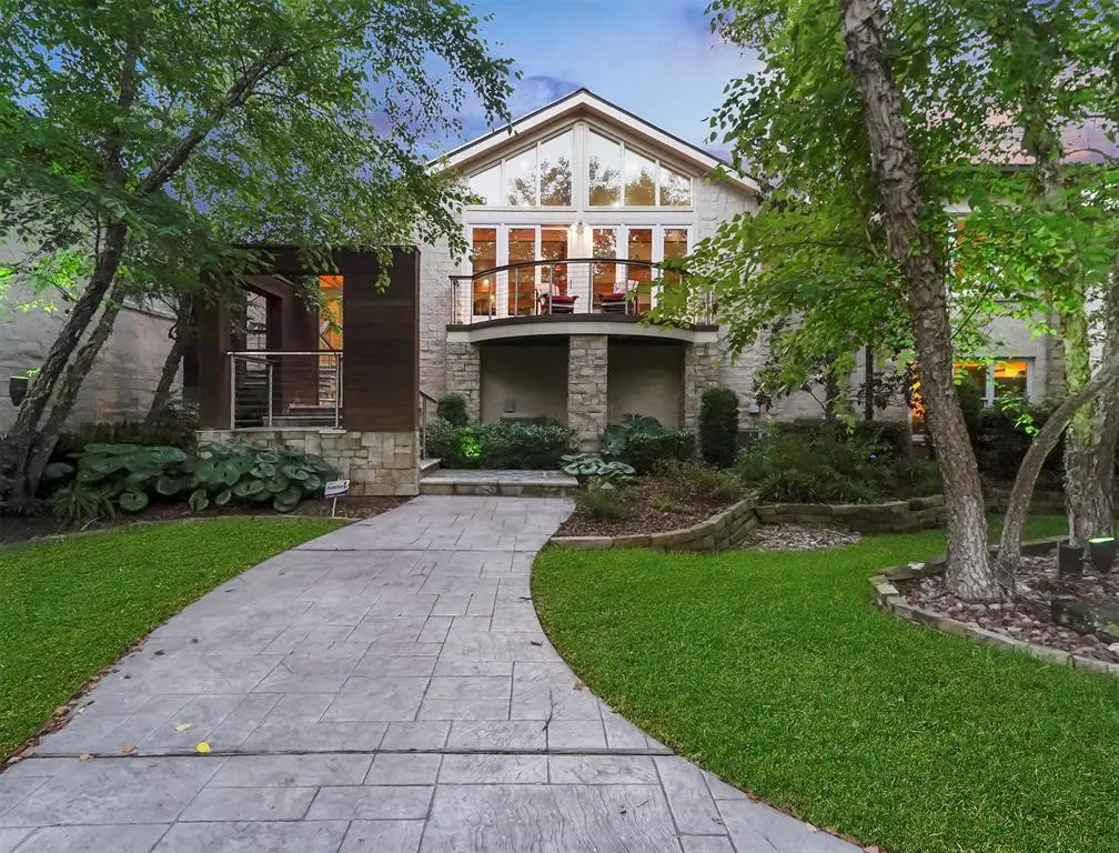 The stunning residence is located at 405 West Spreading Oaks Avenue. 