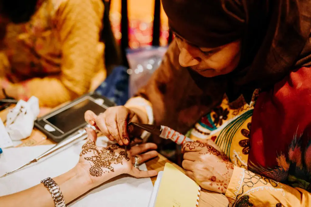 Decorative henna applications are an integral part of the Indian wedding ceremony.  (Photo by Philip Thomas)
