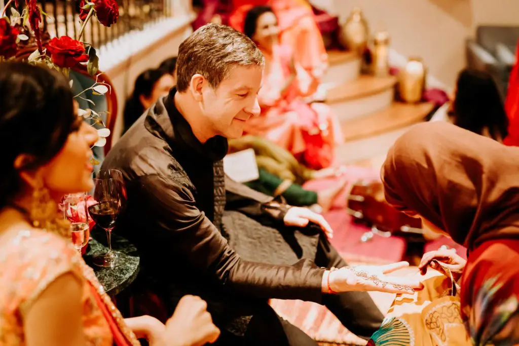 During the Mehndi ceremony, the bride's and groom's hands were decorated with henna.  (Photo by Philip Thomas)