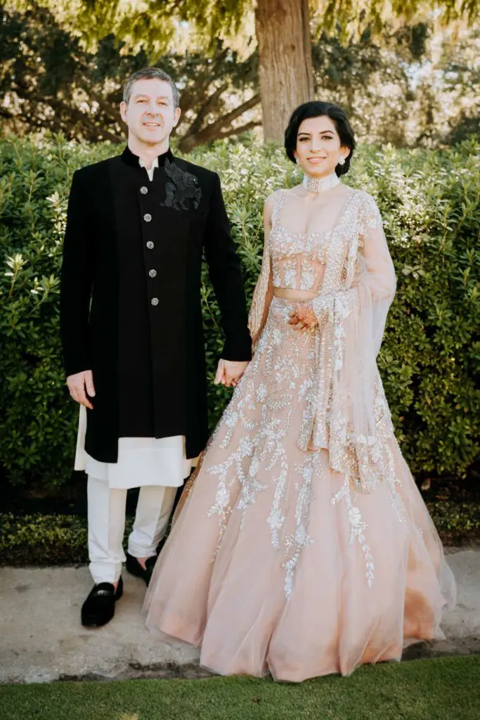 A formal portrait of the groom and bride, Gary Chapman and Puja Verma, on their wedding day. (Photo by Philip Thomas)