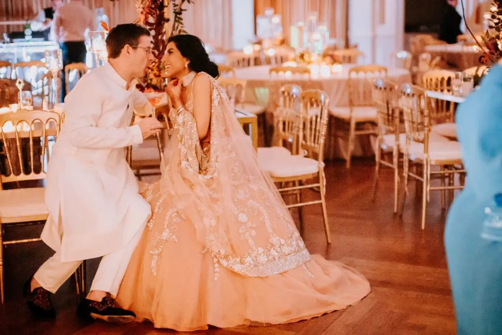 A romantic moment between the newlyweds Gary Chapman and PUja Verma, reception at River Oaks Country Club. (Photo by Philip Thomas)