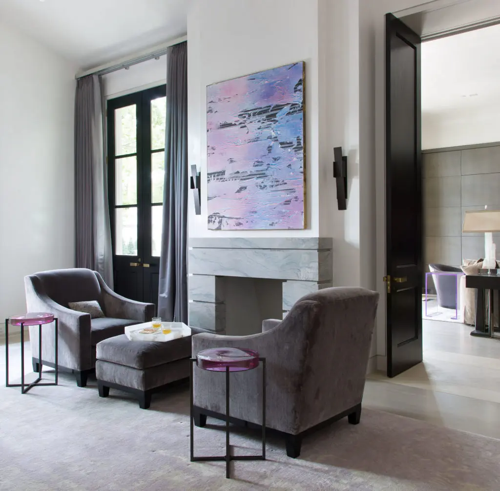 In the master bedroom, Joe Reihsen's 'Lunch with a Cougar,' 2014. A Rudin Chairs and ottoman from E.C. Dicken. Holly Hunt table. Sconces from Ferrell Mittman. (Photo by Emily Minton Redfield)