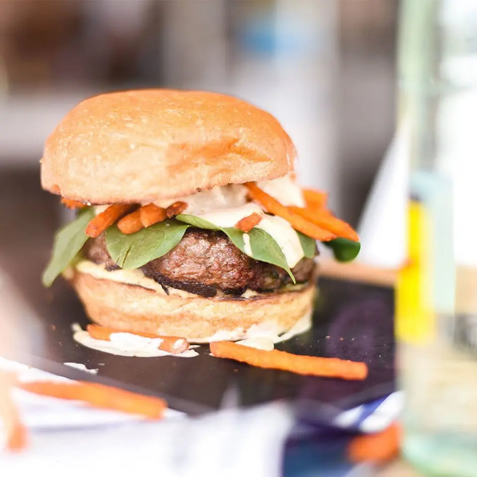 The Gather Burger at Gather Kitchen comes with sweet potato fries.