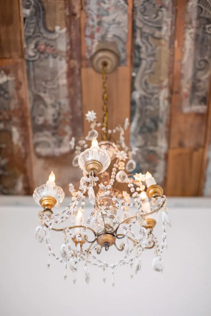Crystal light fixtures and sconces from France and Italy speak to the European ambience of the home listed with Martha Turner Sotheby's International Realty. (Photo by Savannah Montgomery)