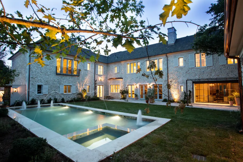 The swimming pool is enhanced with fountains and a built-in spa. (Photo by Savannah Montgomery)