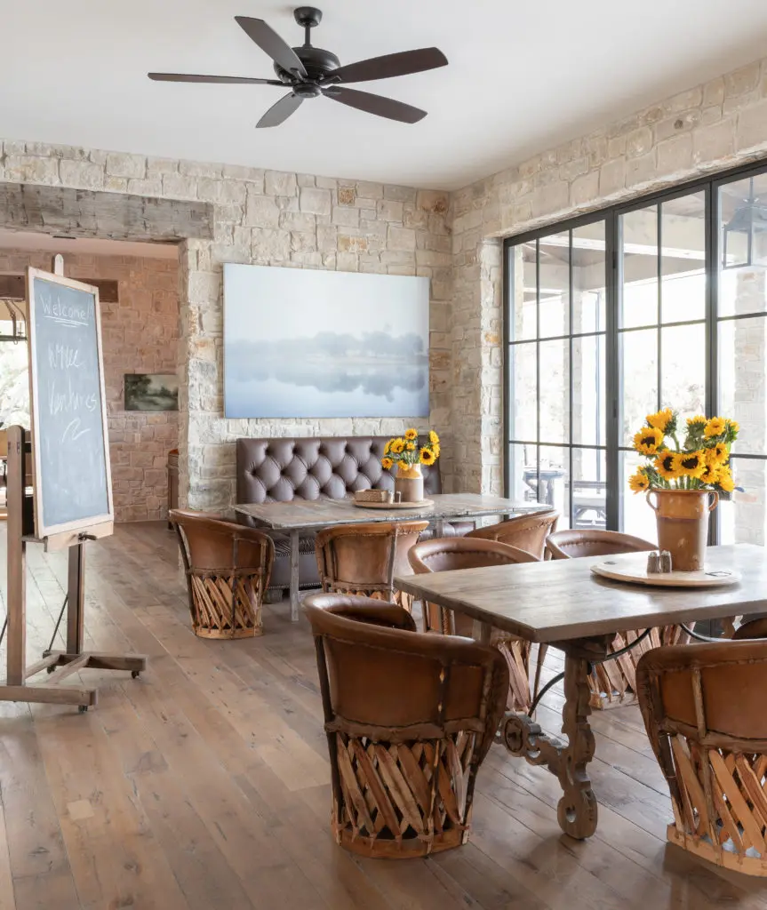 Mexican equipale chairs provide seating in a casual dining area of the main house. (Photo by Michael Hunter)