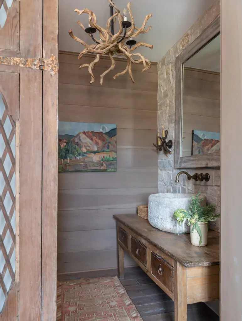 The guest bathroom exudes western influences. (Photo by Michael Hunter)