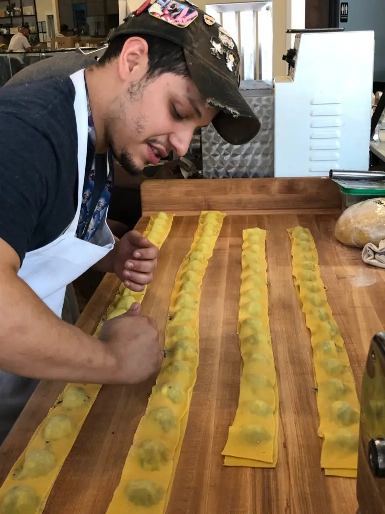 Chef Ben McPherson's team makes pasta, here ravioli, daily for diners and for take-out at his BOH Pasta & Pizza. (Photo by Shelby Hodge)