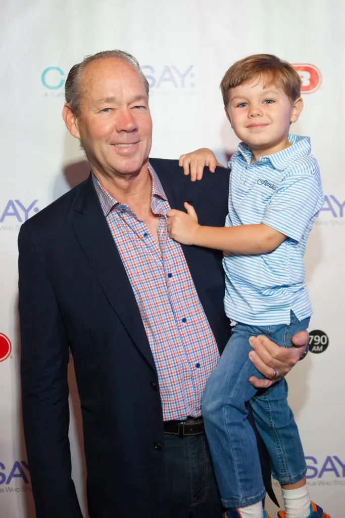 Astros owner Jim Crane and his son, James Robert Crane II (Photo by Todd Parker, STP Images)