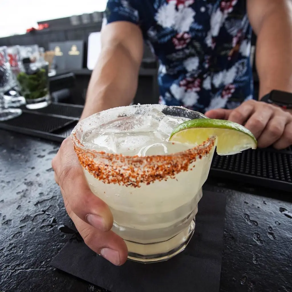 The Clover Club has a $5 happy hour on the rooftop where you can get a Diablo Margarita.