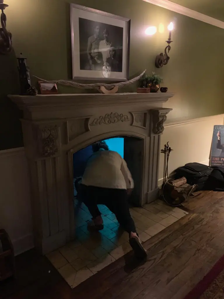 Visitors to Meow Wolf can disappear through a magical fireplace. (Photo by Tarra Gaines)