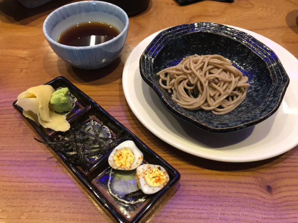 The Zaru Soba (cold noodles) in the third course were accompanied by quail eggs, thin slivers of nori, ginger, wasabi and a special sauce..