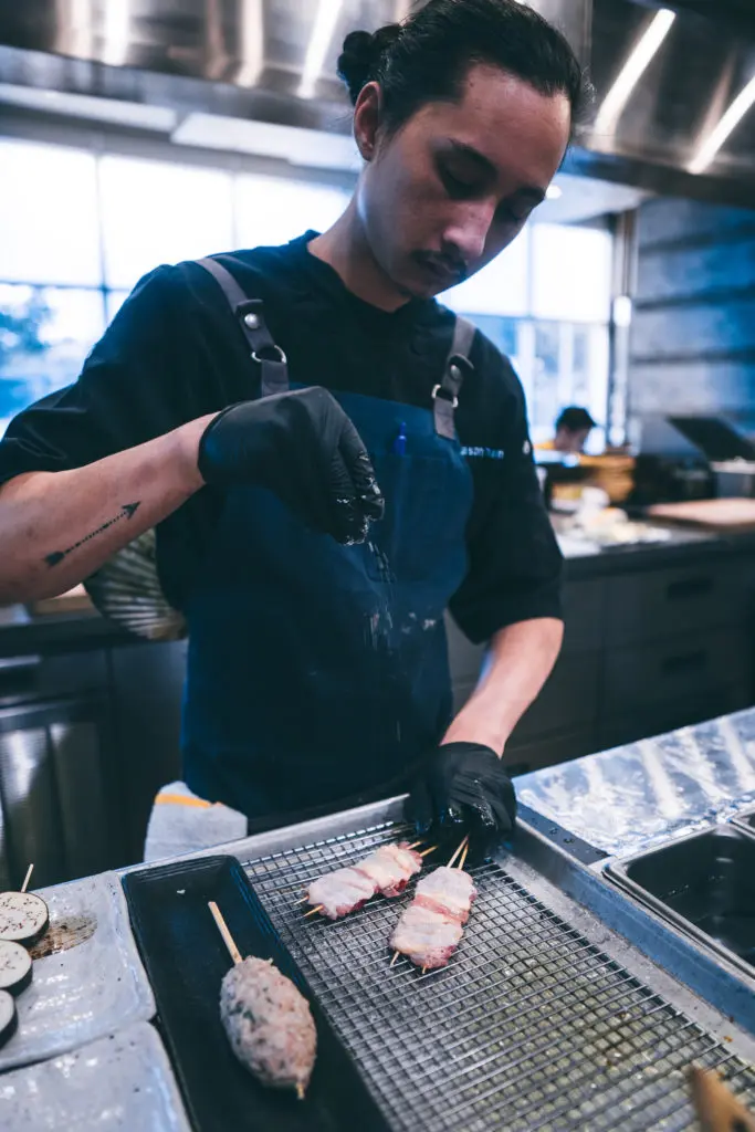 Roka Akor chef Jason Phan prepares kushiyaki for dinner guests who sign on for the new Roka Reserve dining experience.