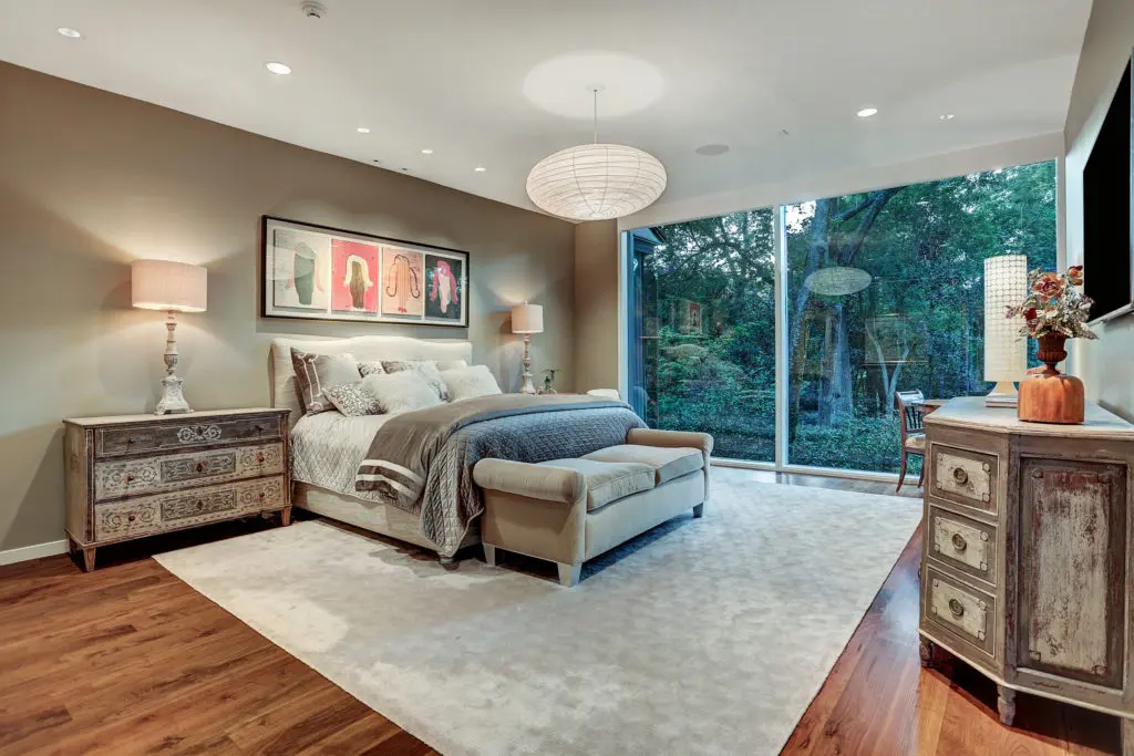 All five bedrooms boast views to the verdant gardens. (Photo by TK Images)