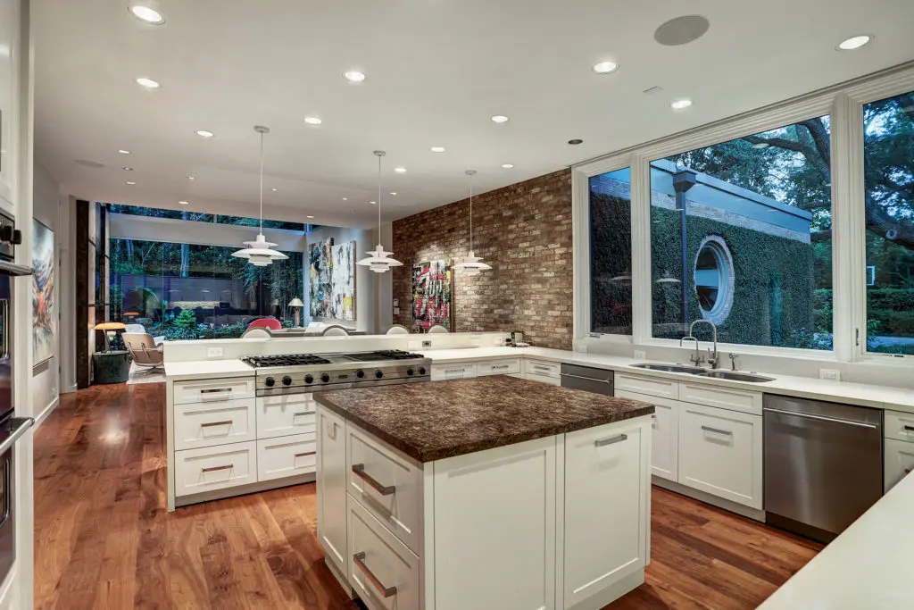 The contemporary kitchen is one of the updating projects that preserved and conserved the house. (Photo by TK Images)