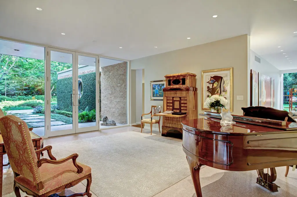 The entry to 2910 Lazy Lane where clean lines and open spaces define the architectural essence. (Photo by TK Images)